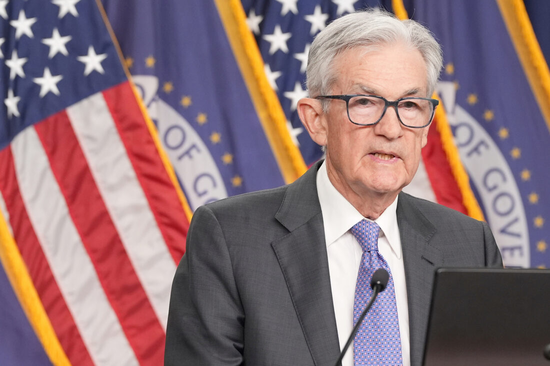 Federal Reserve cuts key rate, predicts healthier economy